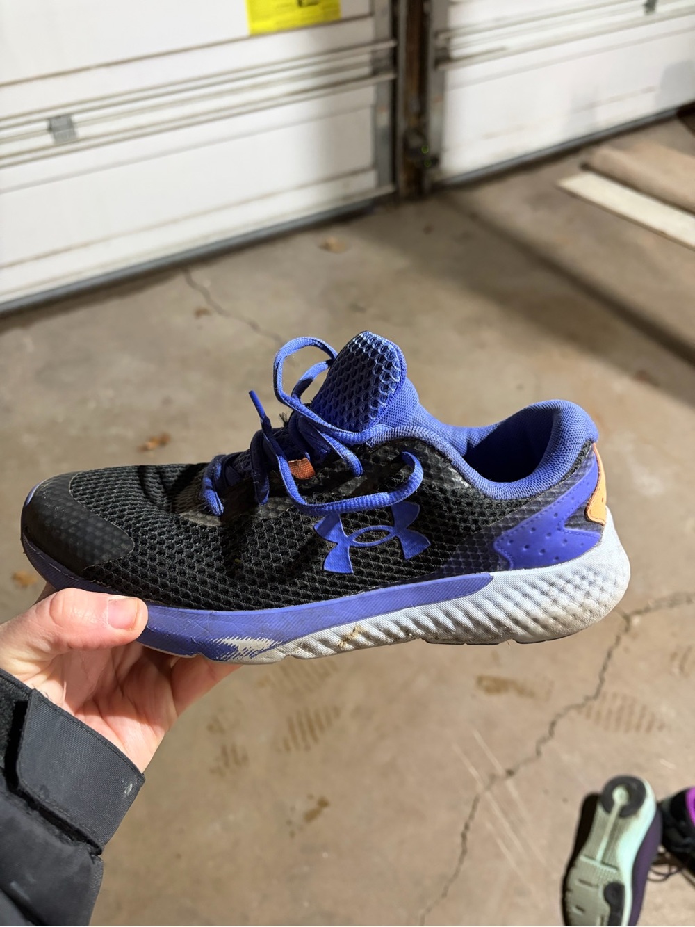 Under Armour Kids Black and Purple Athletic Sneakers with Orange Accent